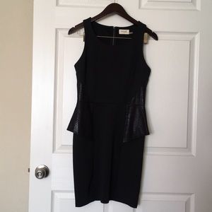 Black peplum cocktail dress